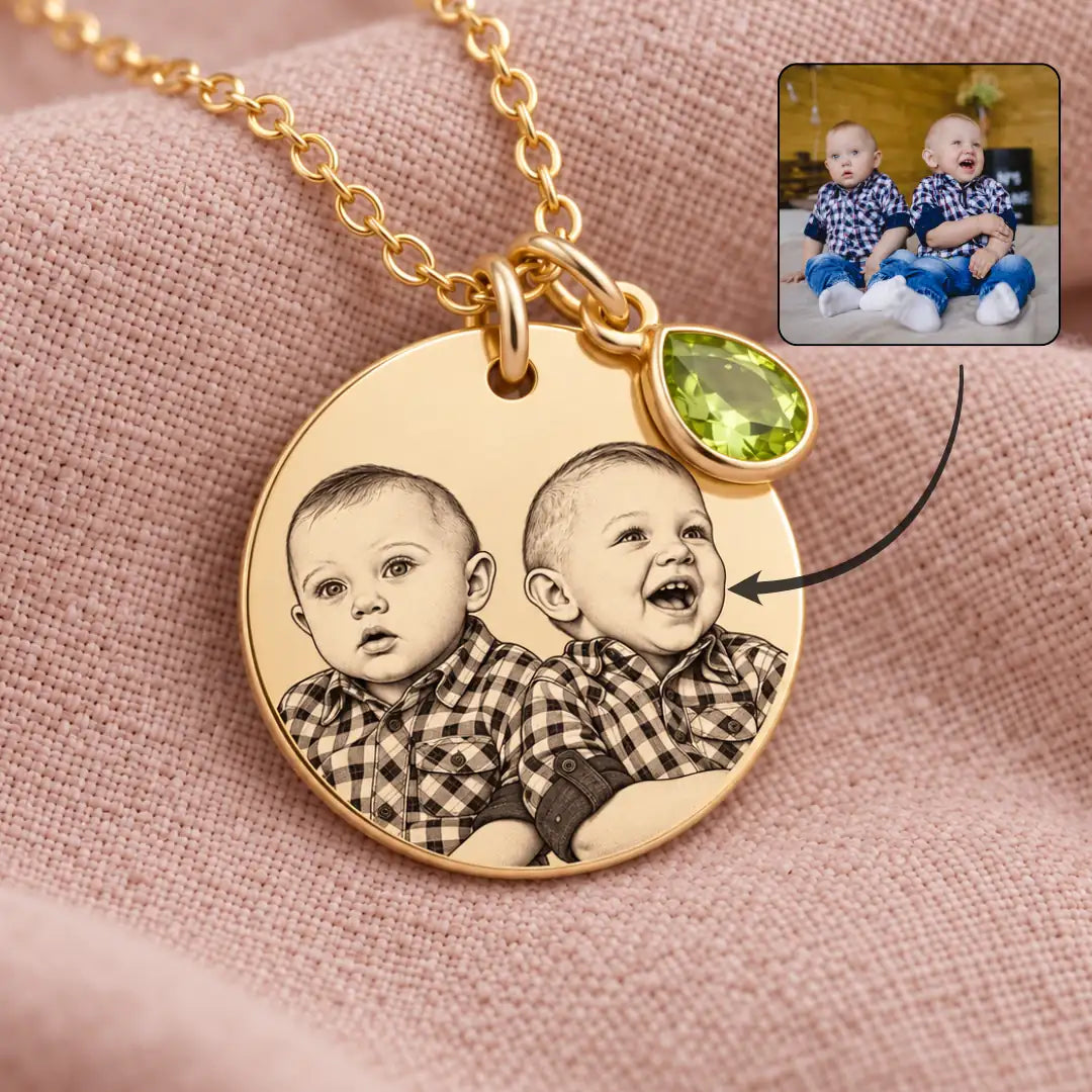 Collana oro con due ritratti e pietra verde